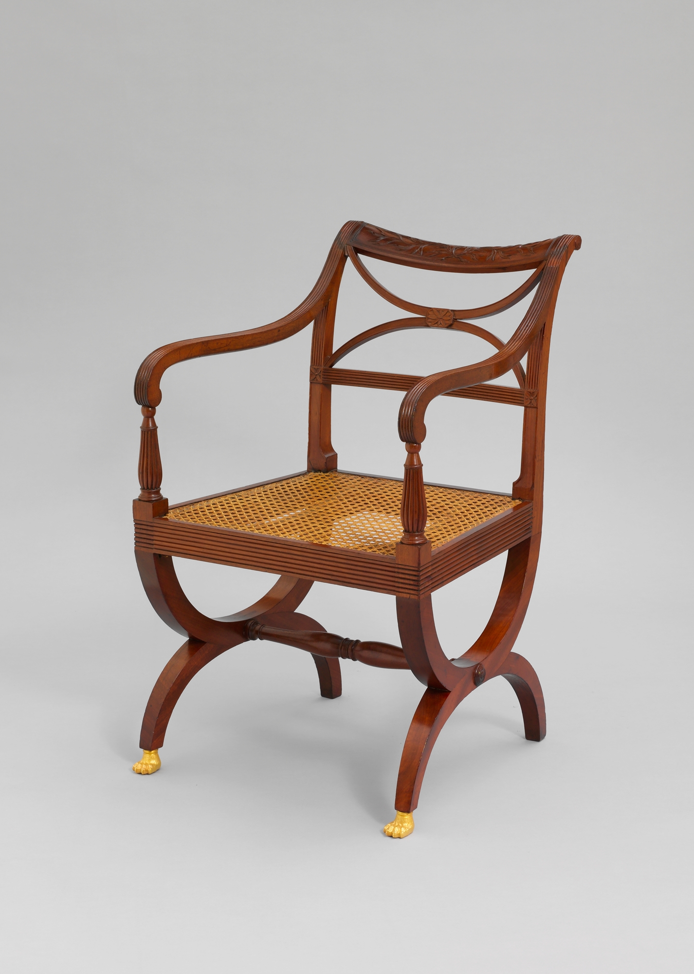 Attributed to Duncan Phyfe (American, born Scottish, 1770–1854). Armchair . 1810–15. Made in New York, New York. United States. Mahogany and brass. 32 3/4 x 20 7/8 x 17 3/4 in. (83.2 x 53 x 45.1 cm). The Metropolitan Museum of Art. Gift of C. Ruxton Love Jr. 60.4.3. https://www.metmuseum.org/art/collection/search/268