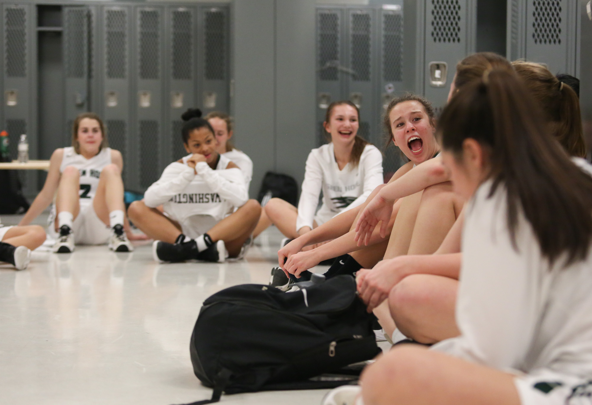  Green Hope girls celebrate the conference tournament championship after winning Holly Springs at Apec Friendship High School locker room on Feb.17, 2017. 