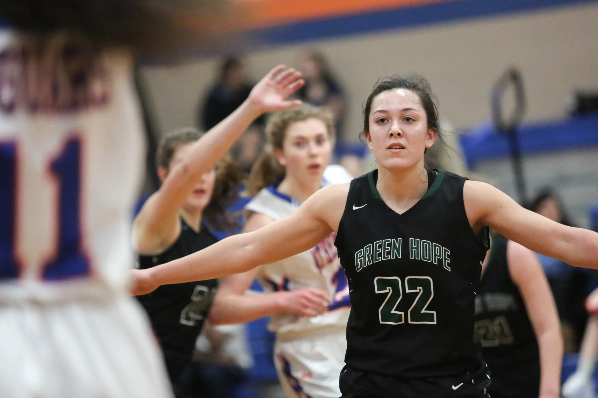 Green Hope's Kelly Fitzgerald blocks Athens Drive's players on Feb.10, 2017. Green Hope won, 55-45.