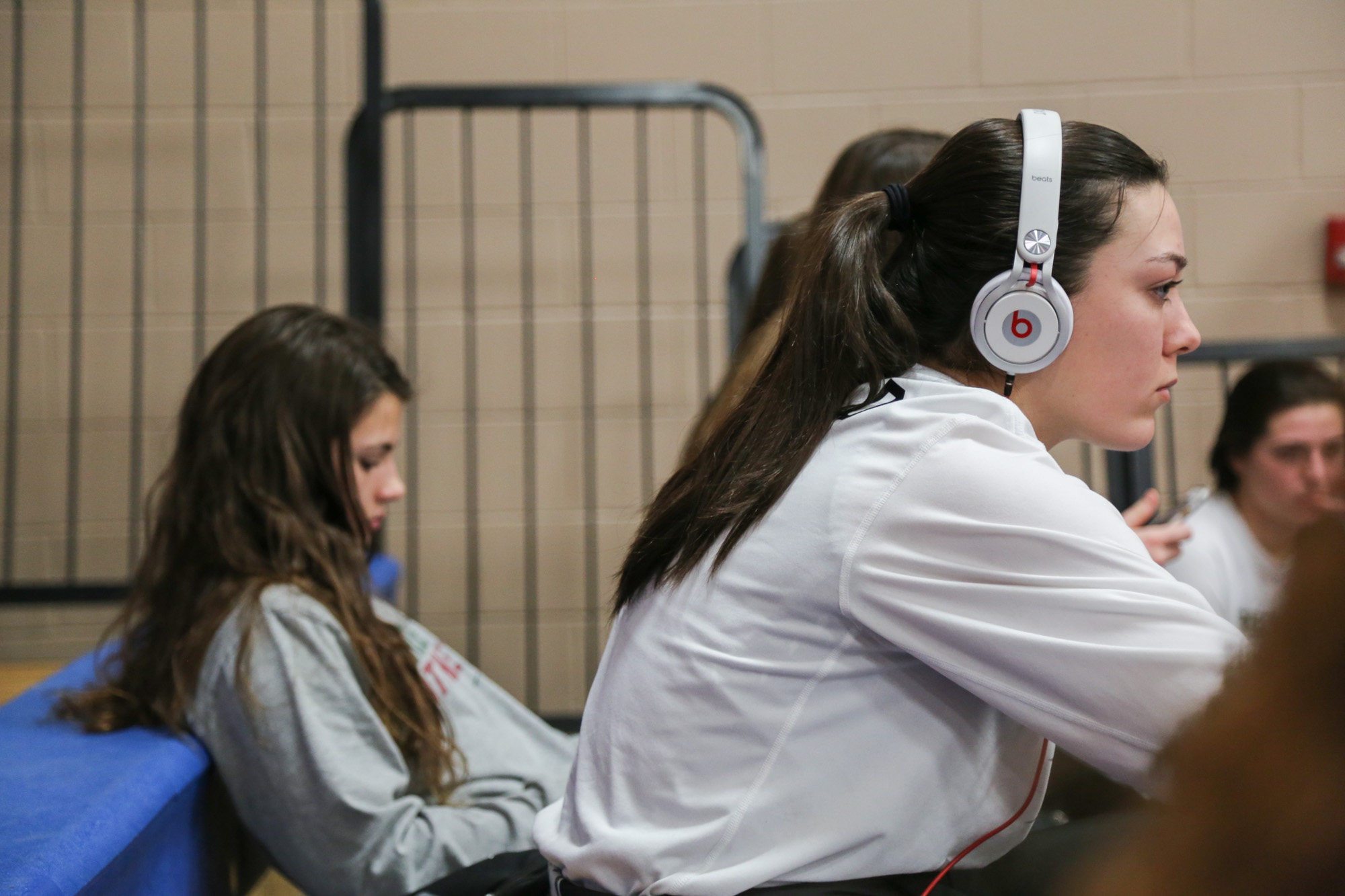  Green Hope's Kelly Fitzgerald and Emily Wynne watch the men's varsity game chilling before their game with Athens Drive on Feb.10, 2017. 