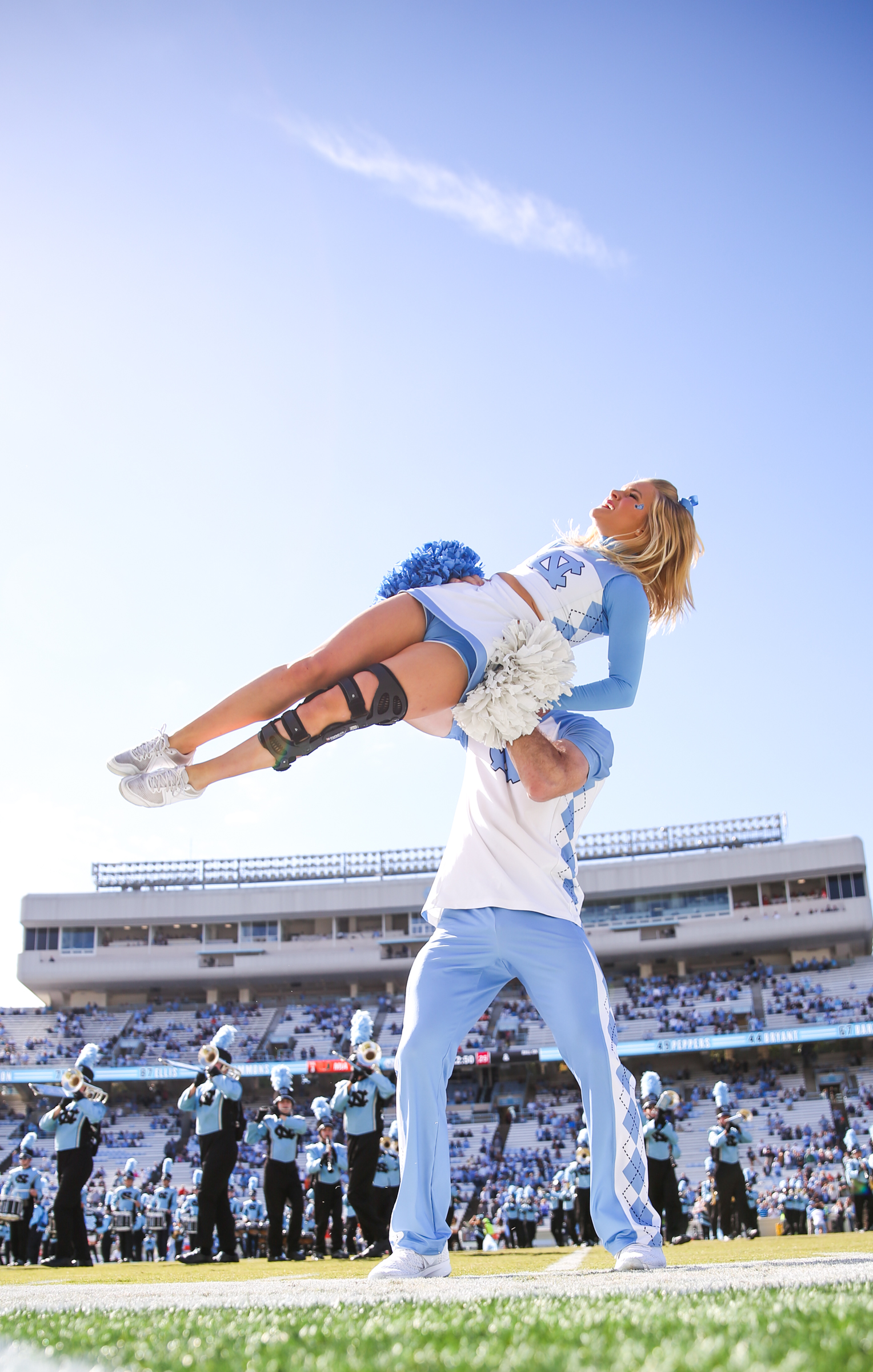 UNC cheerleading team performe before the game. Miami defeated UNC 24-19 at Kenan Stadium on UNC campus on Sat. Oct.28, 2017.