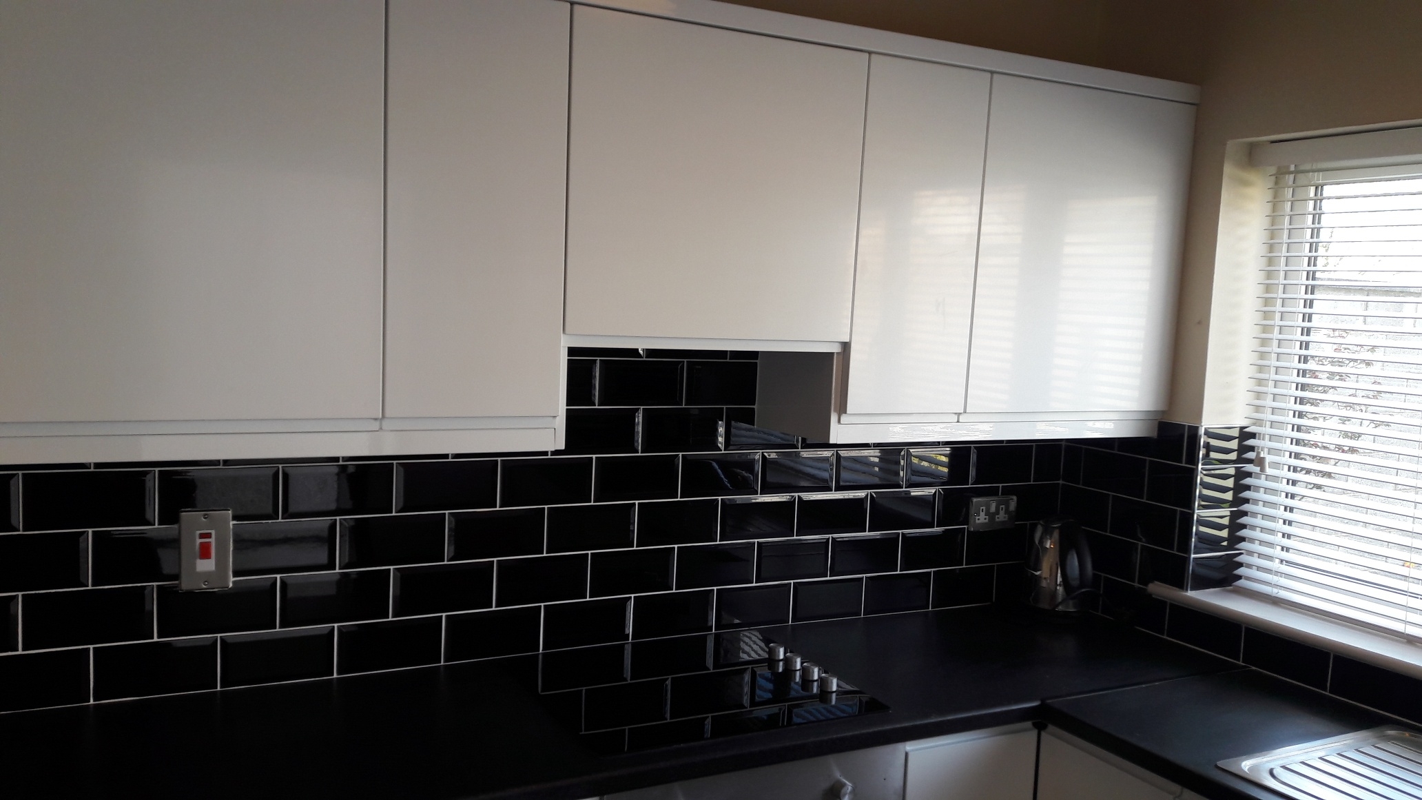 Kitchen with black tiles.jpg