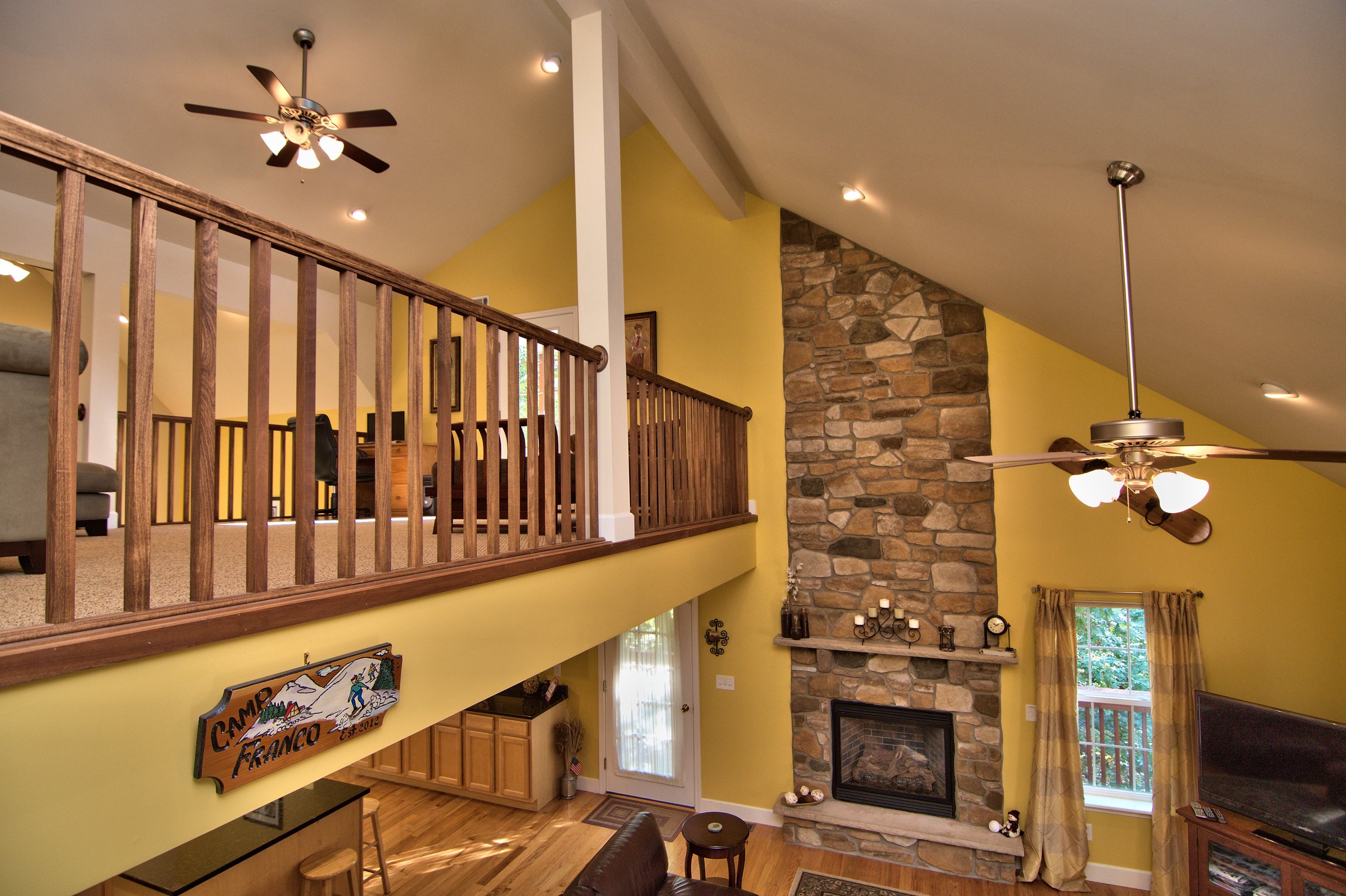 shot of the loft area and some of the living room