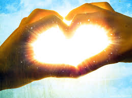 hands heart light power.jpeg