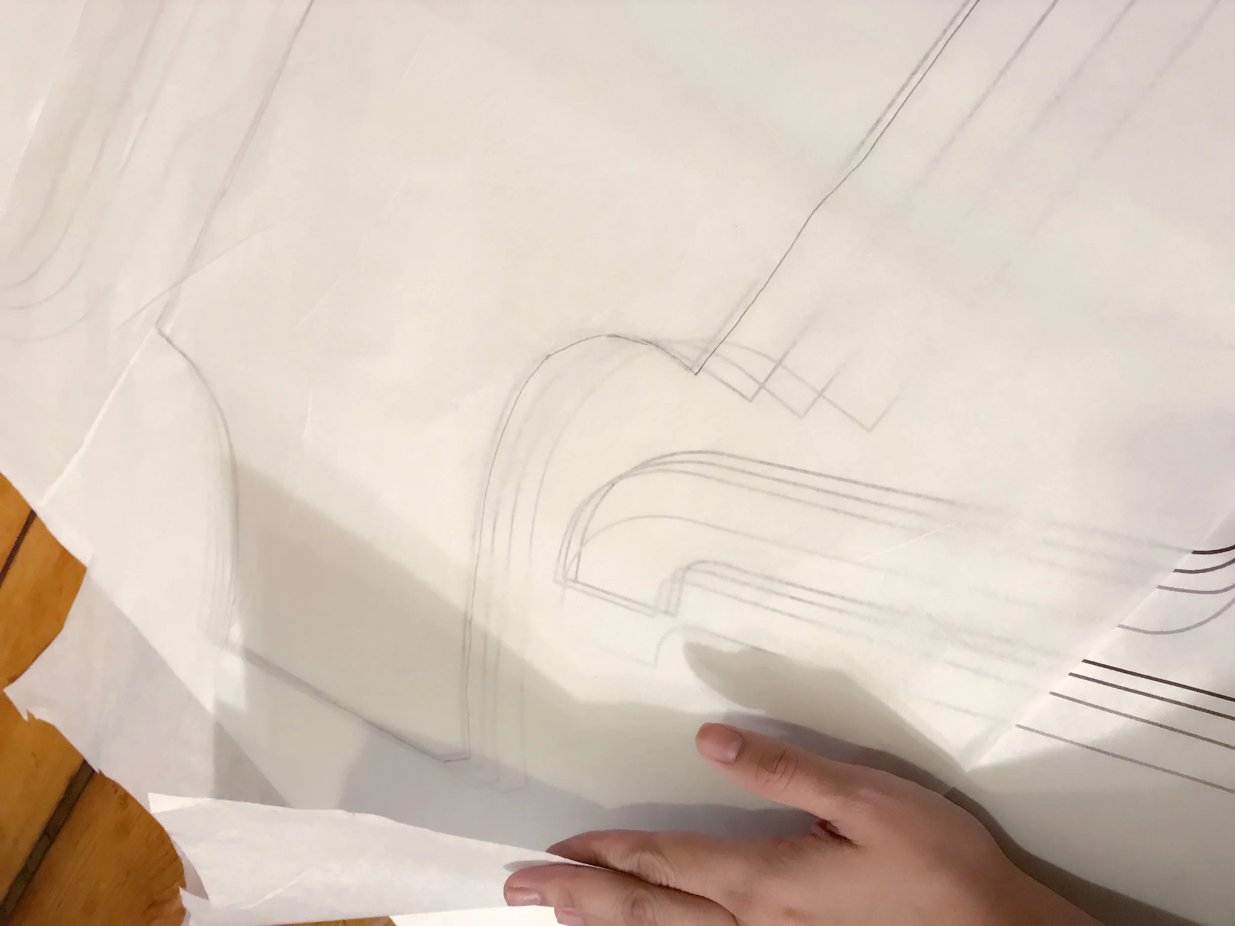 Tracing the original pattern on tissue paper