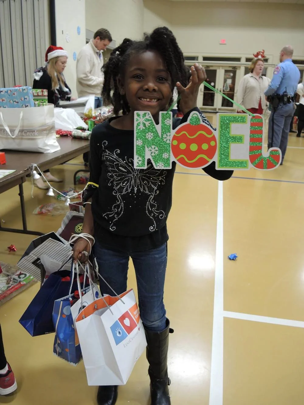 Children's Program Participant Shopping for Christmas Gifts for Her Family.