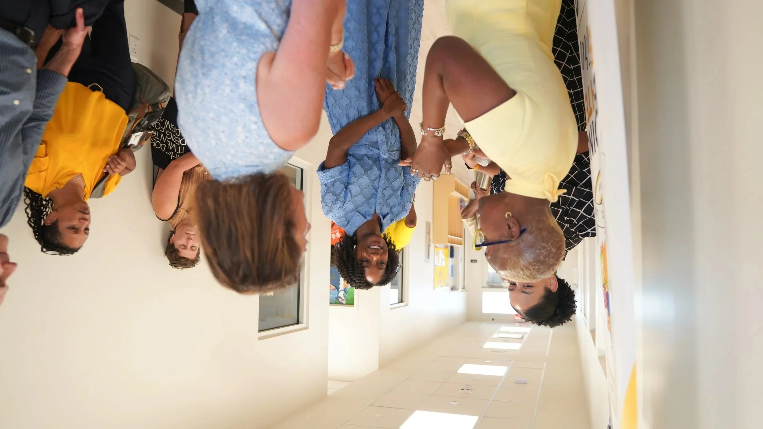 Founder, Rochelle Wilcox, engaging with speakers and stakeholders at the Wilcox Academy Central City grand opening.