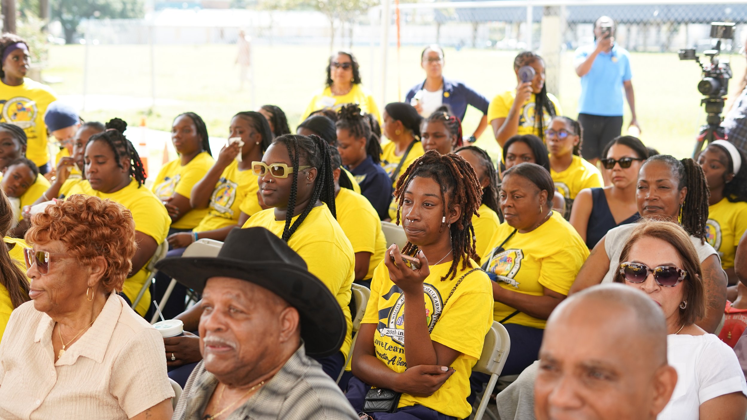 Families and community partners gather for Wilcox Academy Central City's grand opening celebrations.