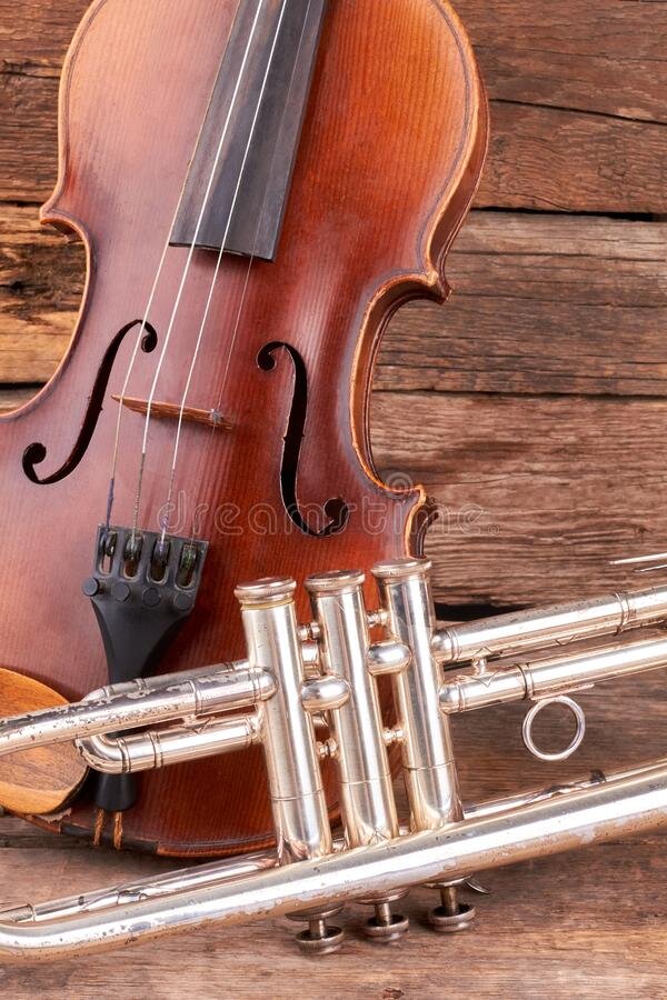 old-violin-trumpet-rustic-wood-classic-music-equipment-retro-style-instruments-symphony-orchestra-old-violin-126341107.jpg