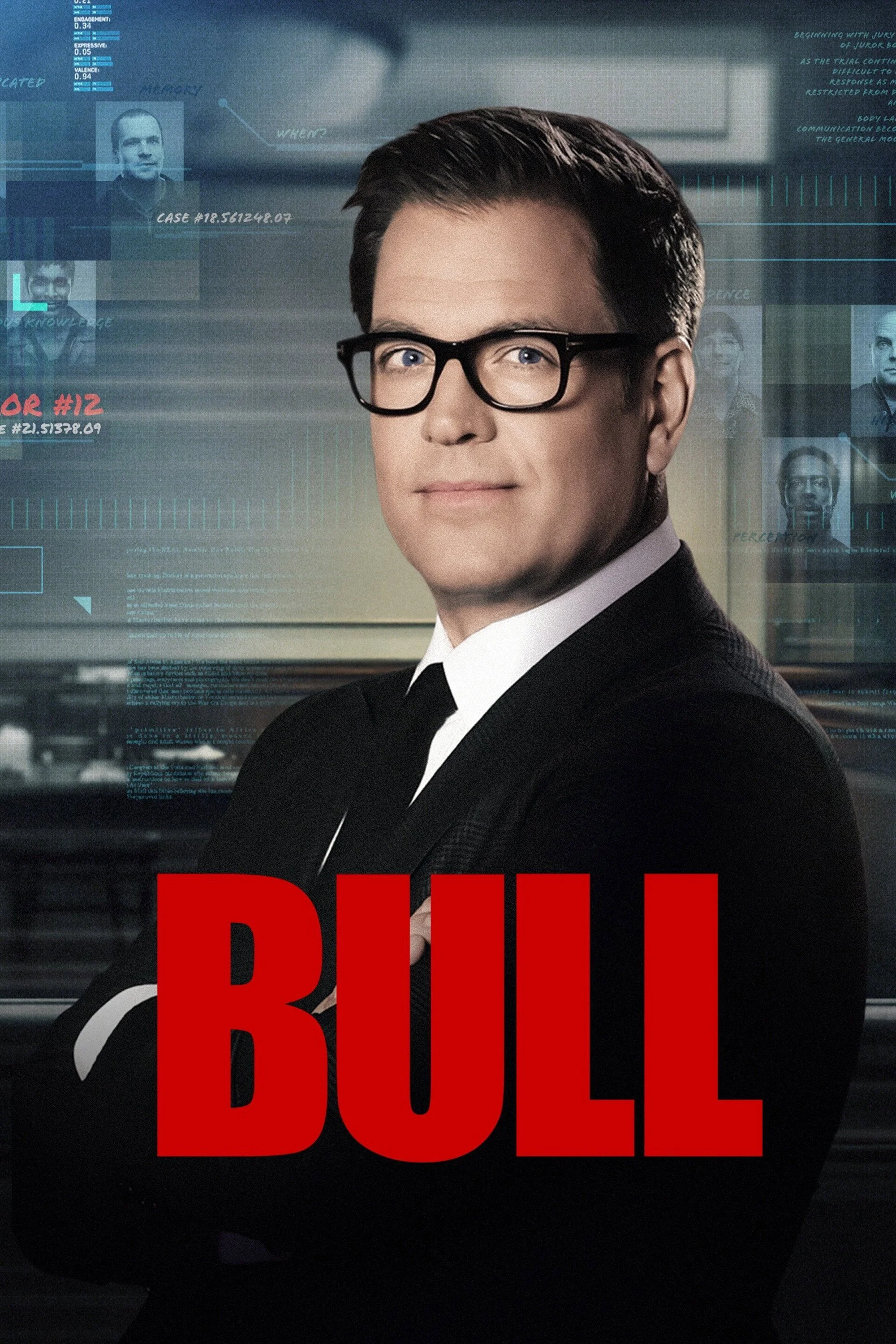 Close-up of a man with glasses in a suit from the movie "Blue Beetle," with technology and holographic images in the background, and the word "BLUE" partially visible in red text at the bottom.