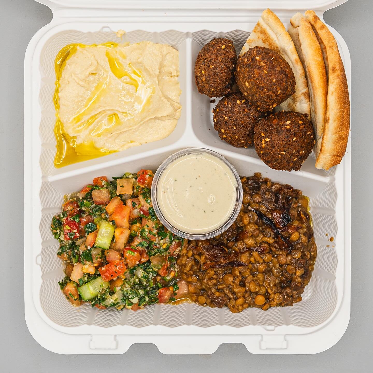 Made 100% in-house, Aviva&rsquo;s falafel is a generational family recipe! We grind garbanzo beans with veggies, herbs, and spices and then fry them in 100% Olive Oil! Have it as a plate with 4 Falafel plus your choice of 3 sides. Comes with tahini a