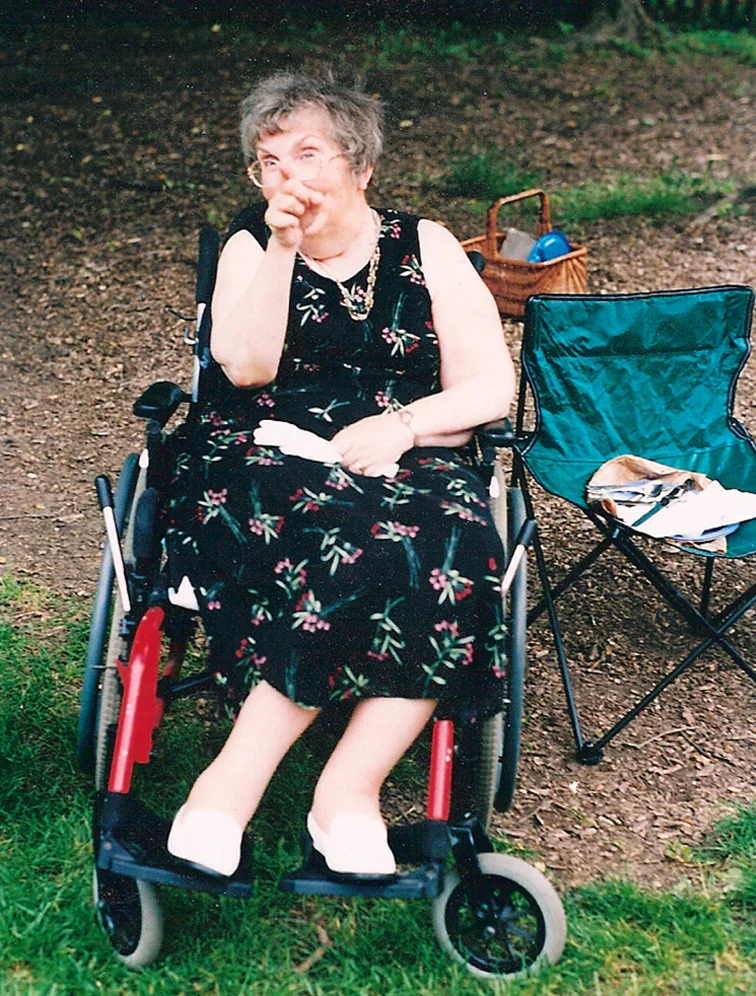My Mom would wiggle her index finger at me either when I was in trouble, or when saying "You're so funny, you should be a comedian." For this pic, I think she was pointing at me for eating all the potato salad.