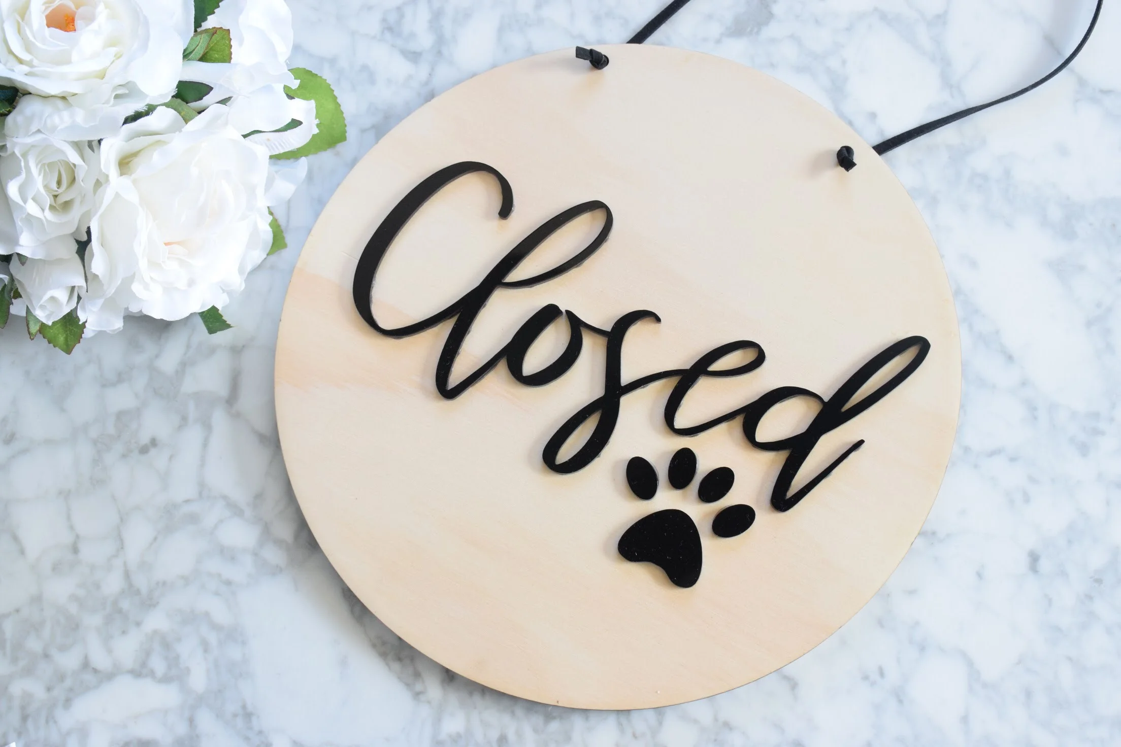open closed sign with paw print