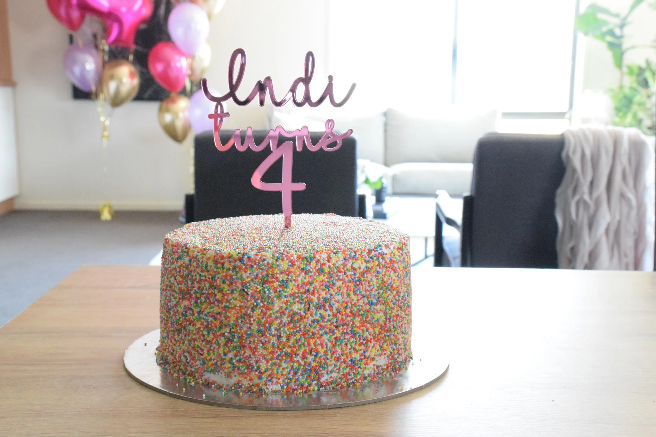 "name" turns "number" cake topper