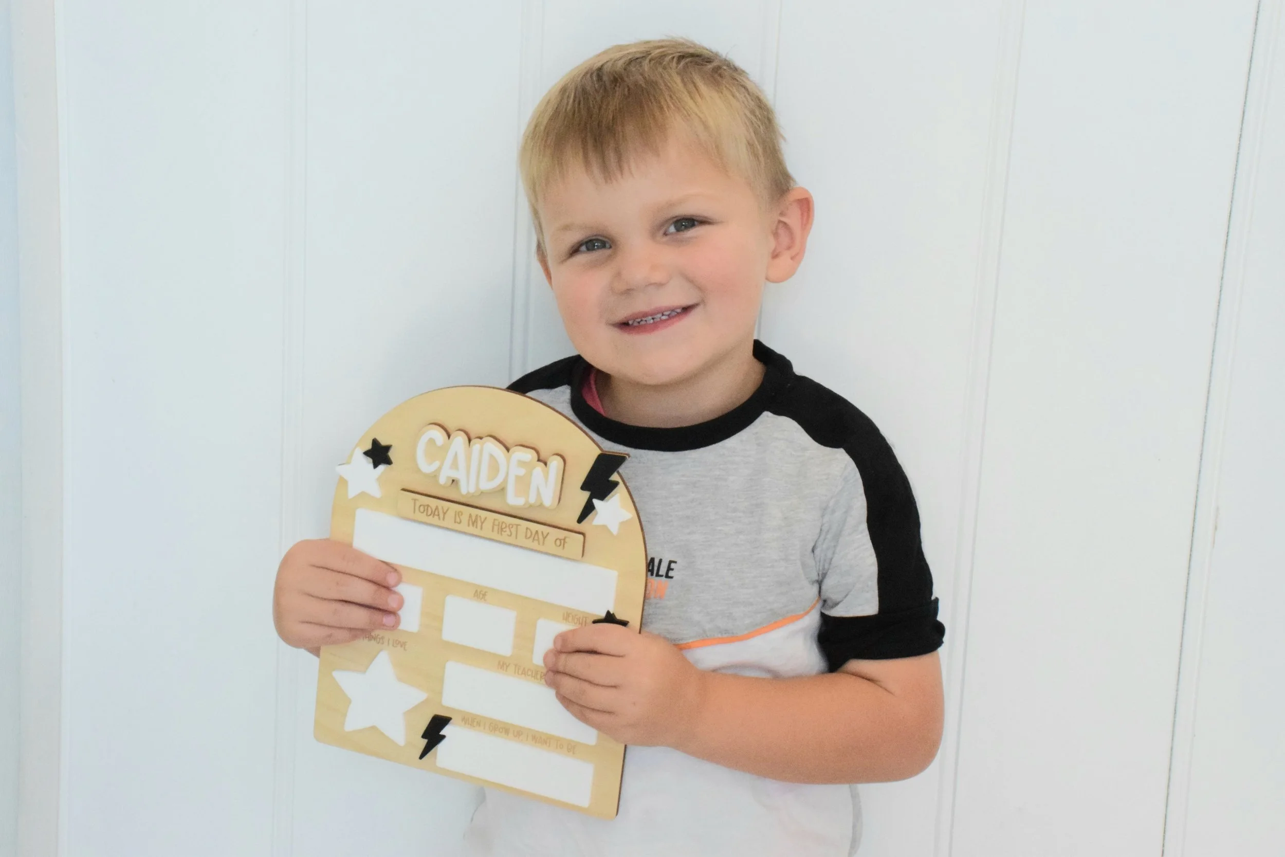 back to school board lightning bolt and star design