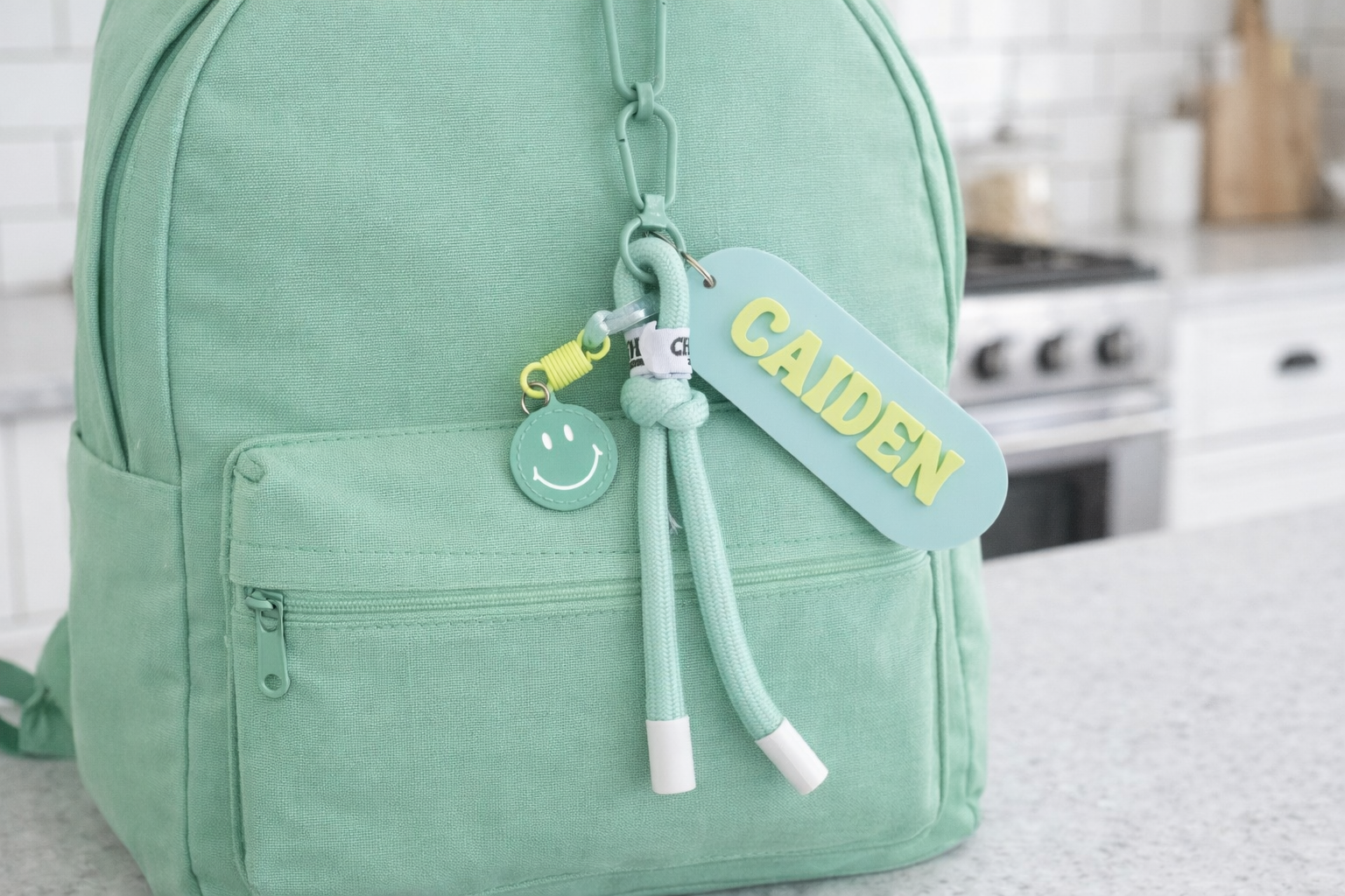 Smiley face and cord bag tag