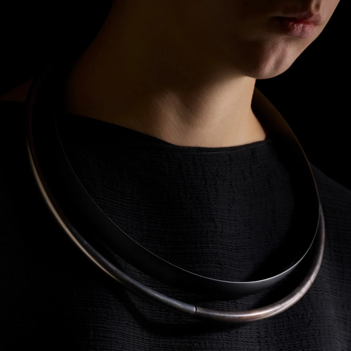 Black Bangle Torque and Weathered + Silver Torque . Oxidised + polished sterling silver. Both pieces: OO/A 