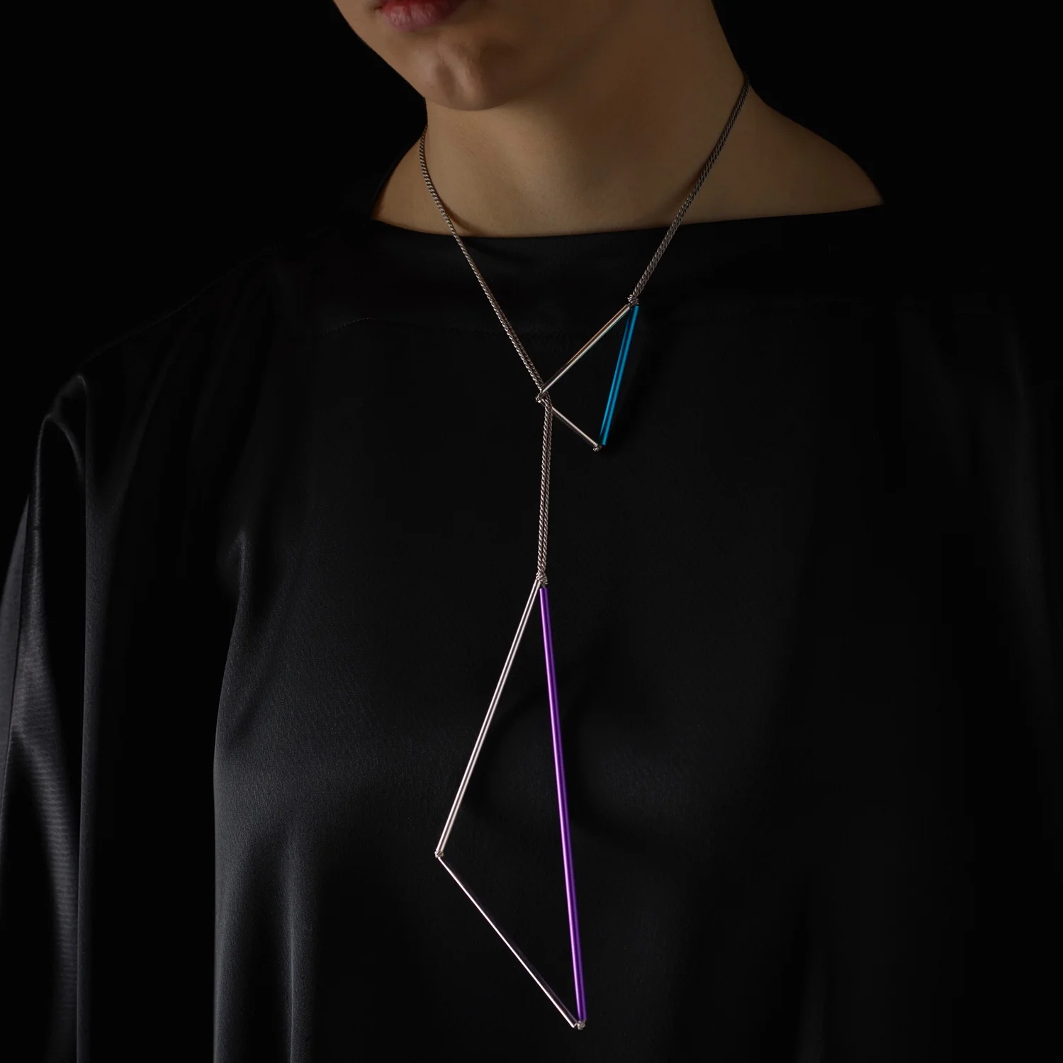 Triangle, Triangle in anodised aluminium, silk + sterling silver. SIG