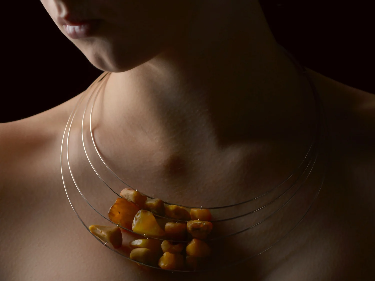 Raw Amber Traces . Raw amber, sterling silver. OO/A