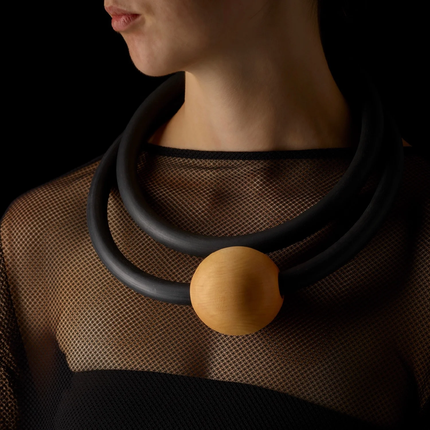 Neoprene Forest Torques. Huon pine + neoprene. Wood turner, Trevor Semmens S IG