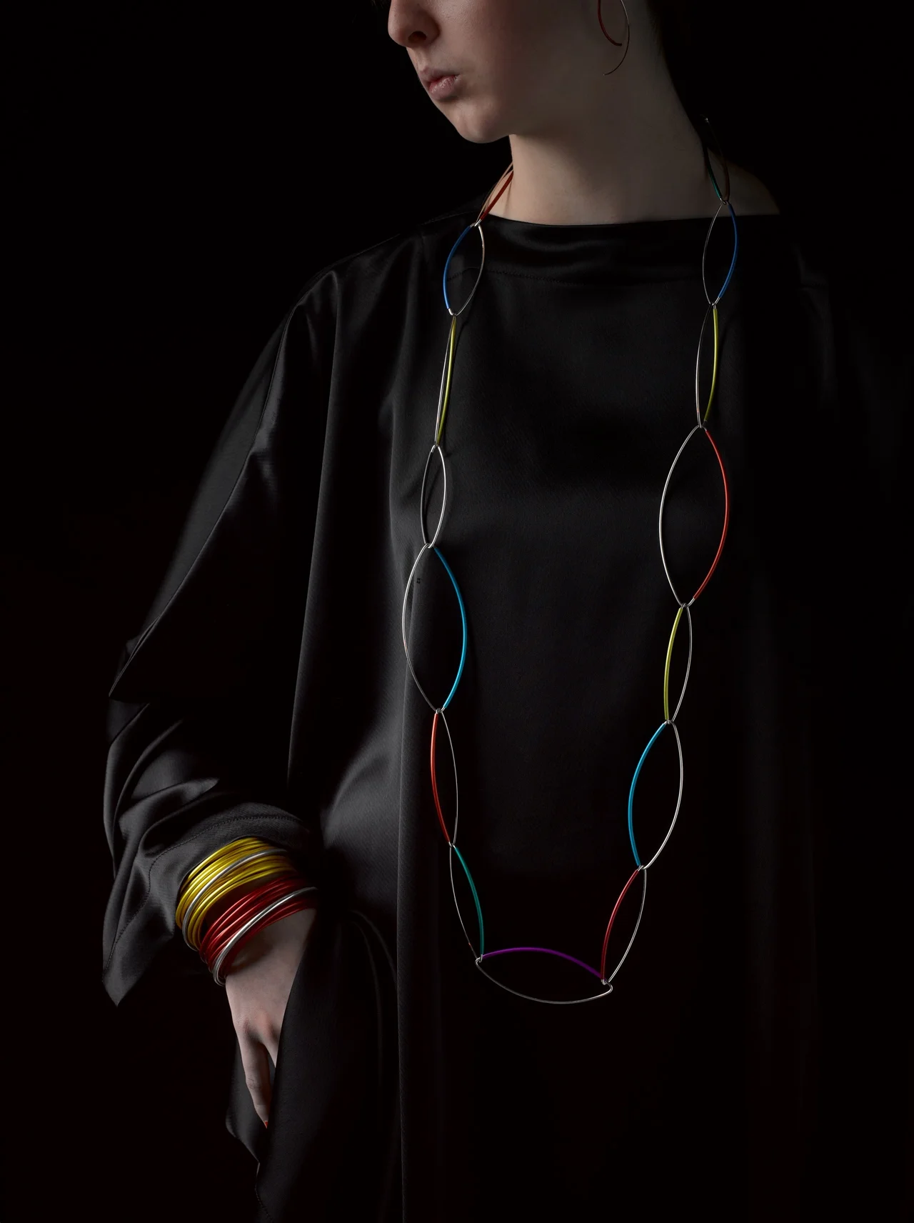 2013 Wearable Geometries at Bini Gallery. Carousel Leaf and Bougainvillea Wraps in anodised aluminium + sterling silver. SIG