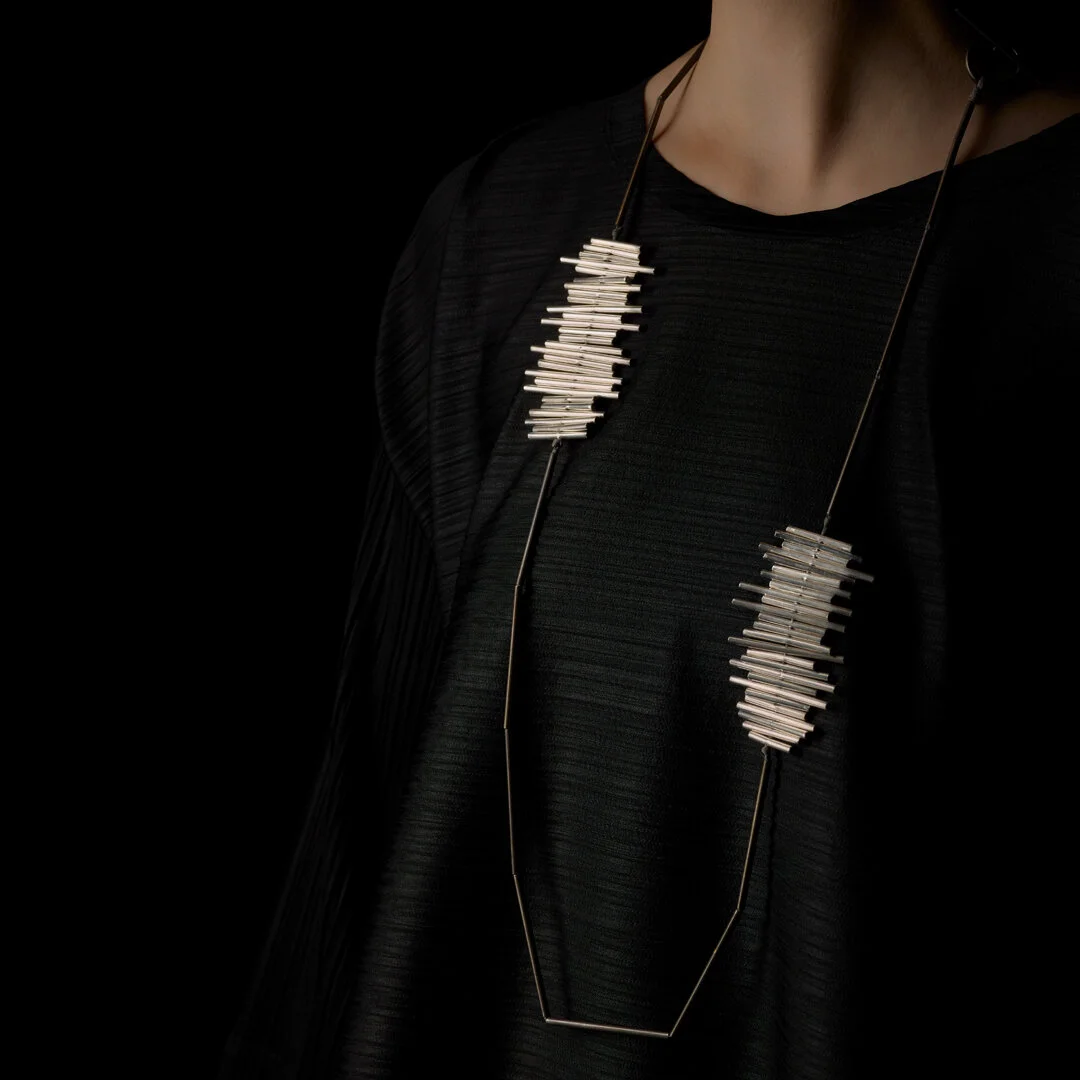 Horizontal Scrub (lon g). Sterling silver, oxidised sterling silver + silk. OO/S