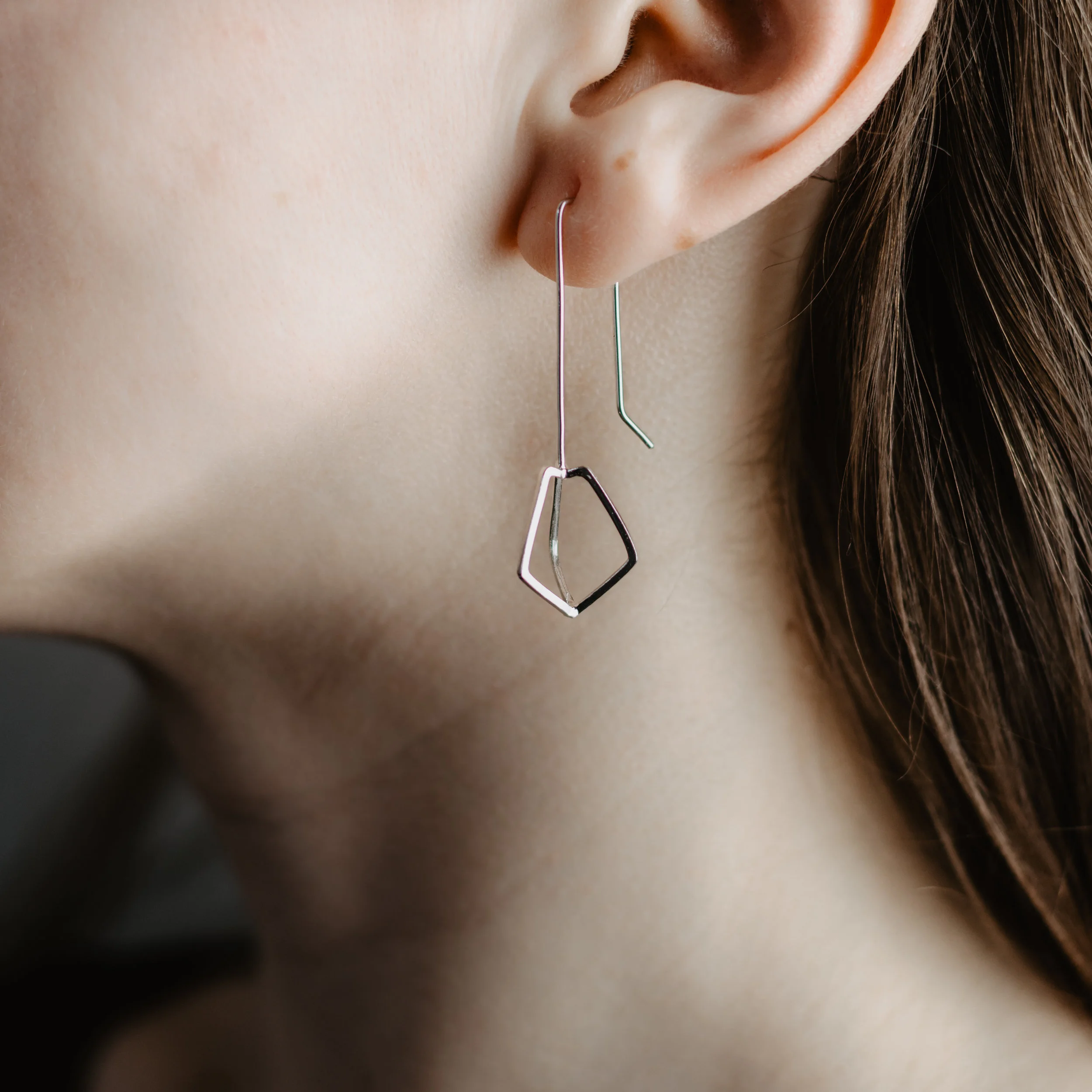 Kate McLaughlin Jewellery Tail Fin hollow earrings model shot