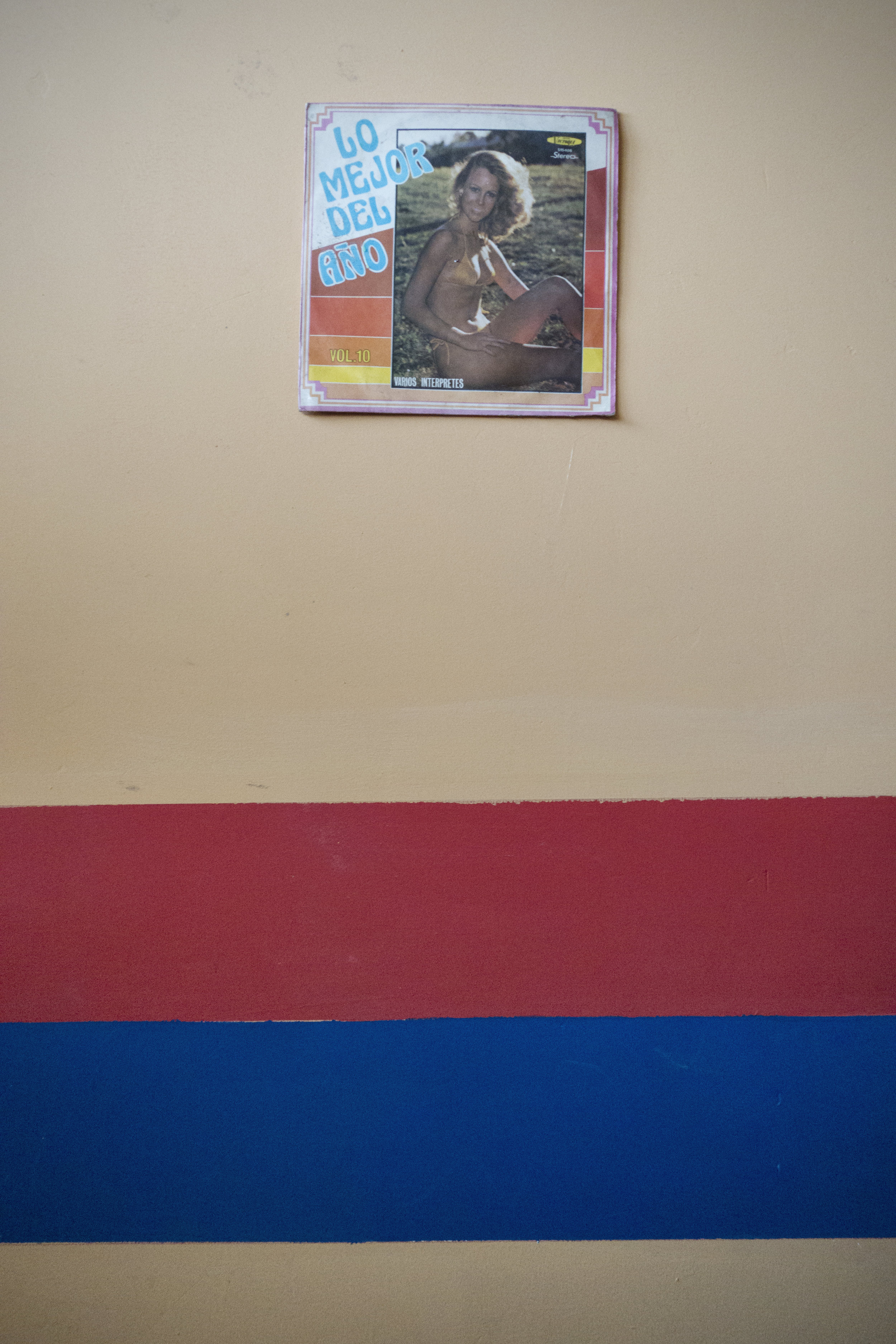 A photo of a woman with the text "The best of the year" hangs in the storefront of Jeimy's parents' home. In Colombian culture the "machismo" mindset is strong and widespread. Reproductive rights social worker for Oriéntame, Erika Marín, said this is the biggest challenge when it comes to women's reproductive health because it means enacting cultural change. "One (challenge) is how to change the structure in which society understands women," Marín explained. "Like seeing women as only related to reproduction for example. It's something that has a lot to do with gender perspectives, like changing many roles and attitudes."