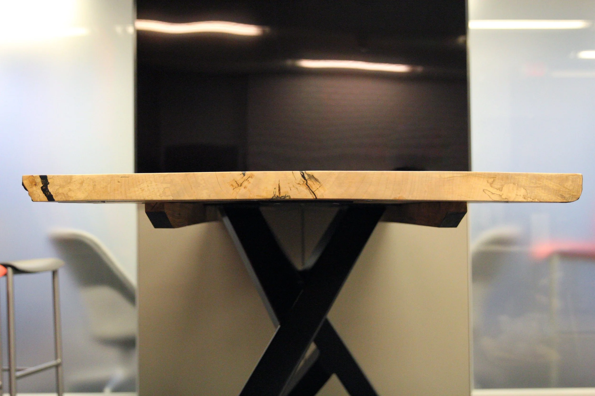 Inspired by the twisting, winding roots of a tree that support huge trees - this table was a perfect metaphor. As a place to support the meetings of a large organization like Avison Young. 