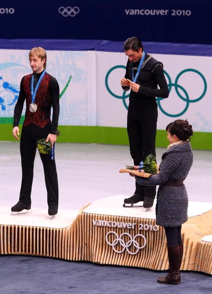 On the medals stand in Vancouver // Getty Images 