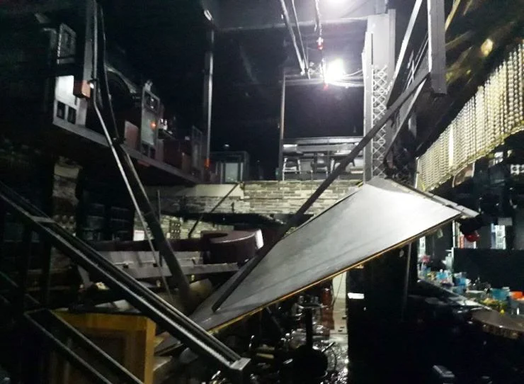 A "soft bang," nightclub chaos -- and two dead