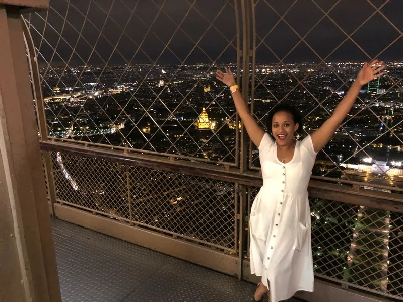 Me stopping just before the tippy-top of the Eiffel Tower