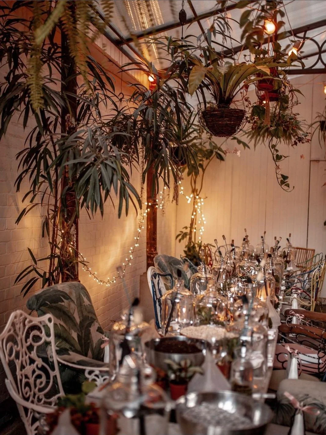 The plant-filled interiors of Bourne and Hollingsworth Buildings