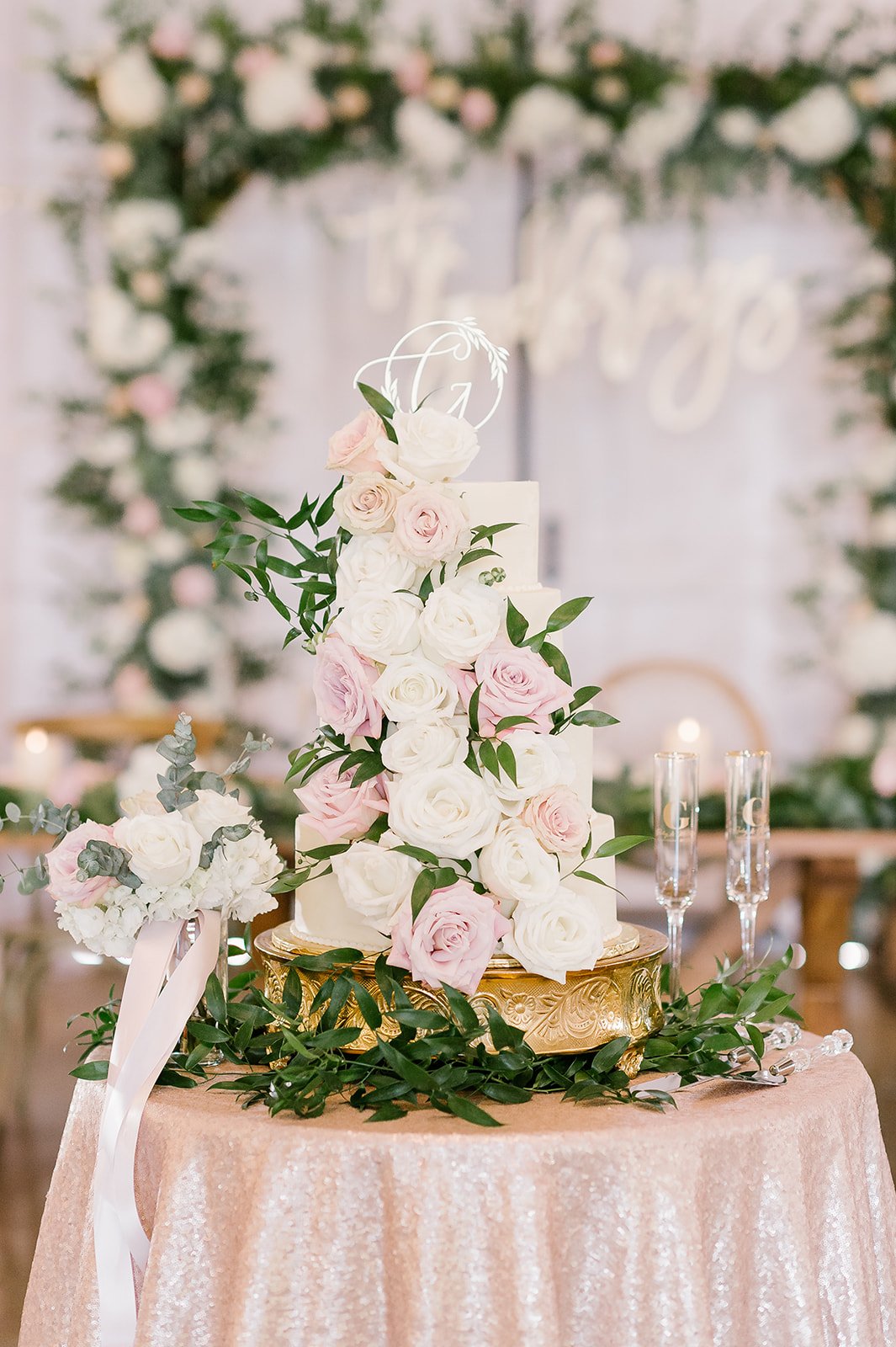 Blush and white cake florals with floral install frame