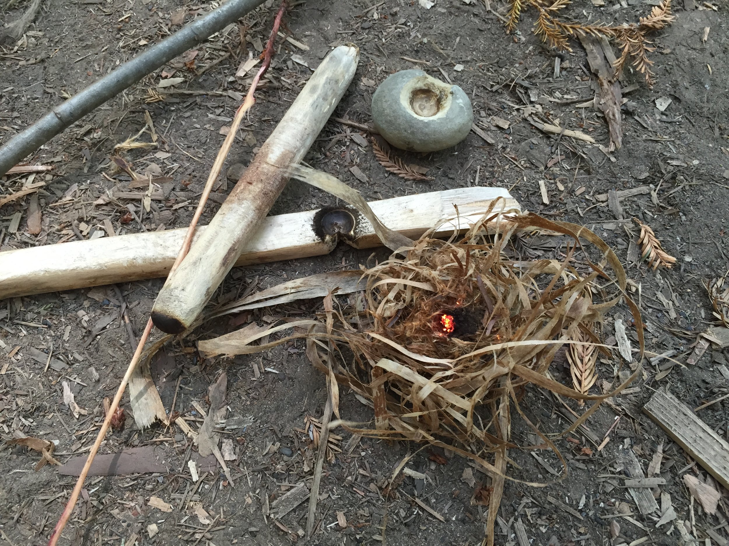 "Off The Land" Bowdrill Fire, Hand pecked stone handhold and rootlet cord.