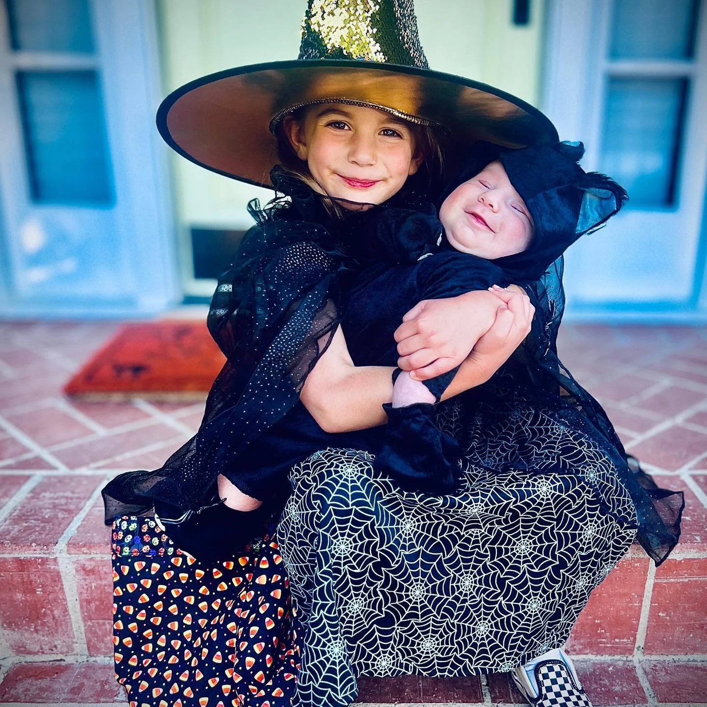 Witchy Sister and her Brotherly Black Cat.