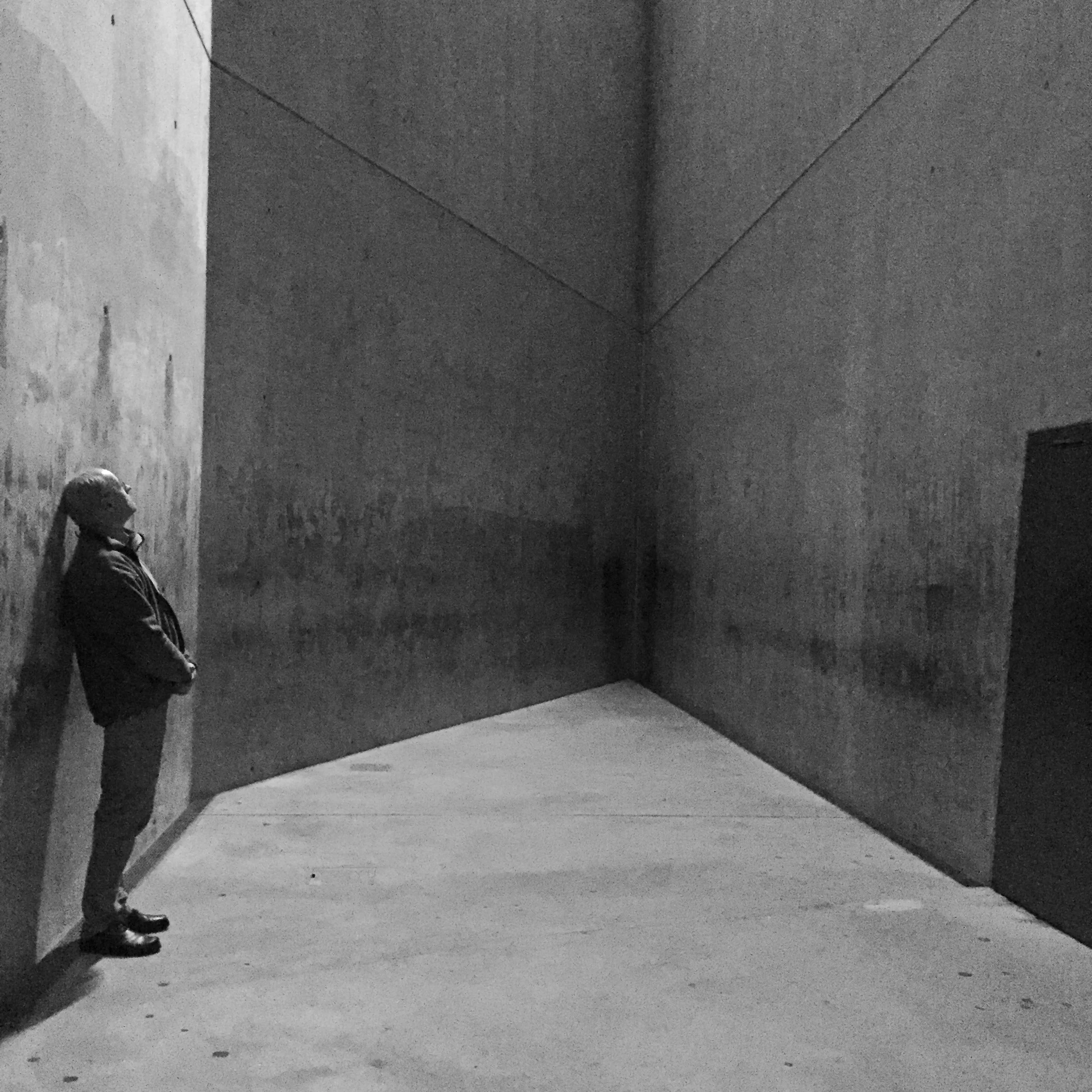 A fellow visitor reflecting in the Voided Void or Holocaust Tower at the Judischer Museum in Berlin. 