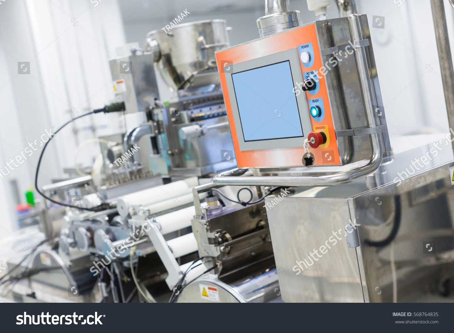 stock-photo-big-manufacture-machine-with-shafts-and-control-panel-568764835.jpg
