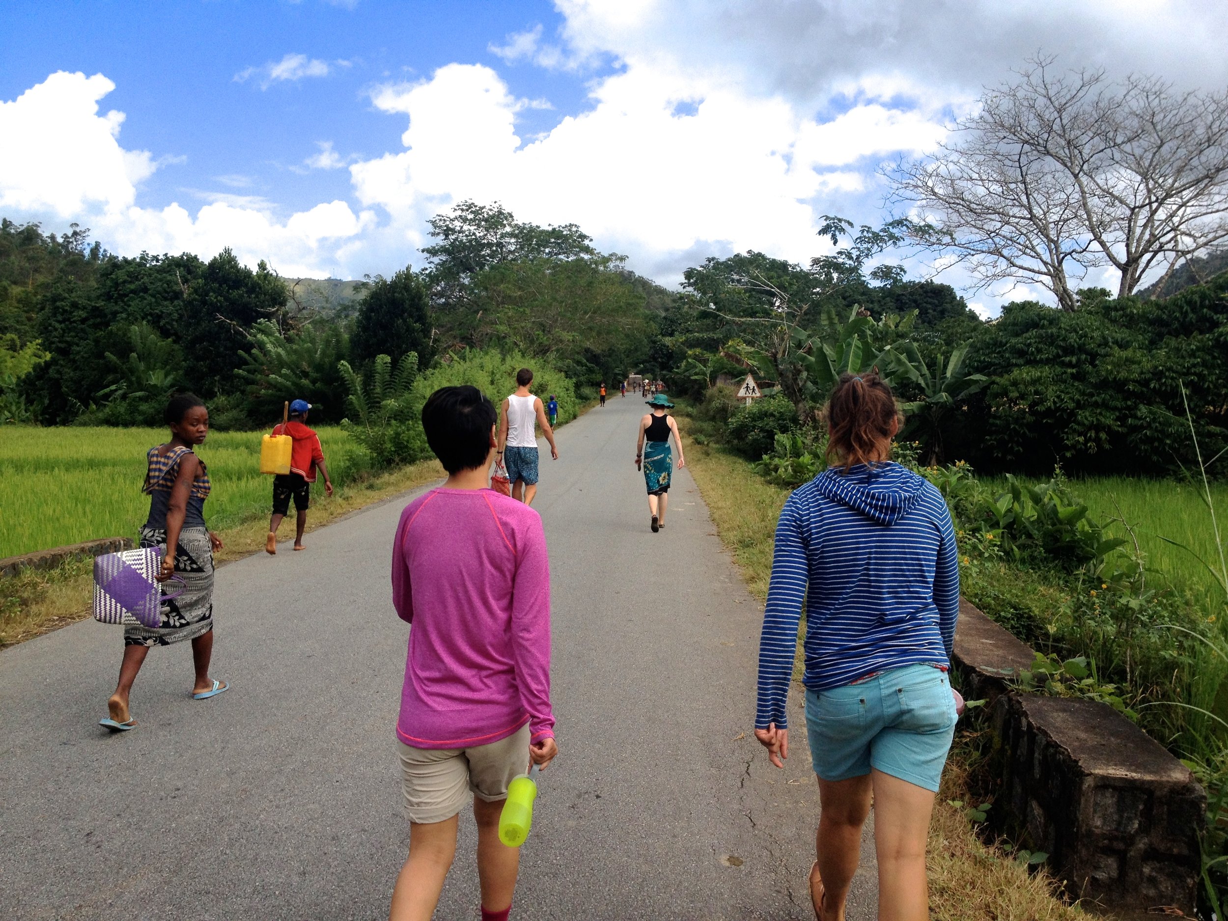 Most people travel to market by foot along this road, the main highway between Fianarantsoa and the coastal towns. No action goes unaccounted for with so many people out and about.
