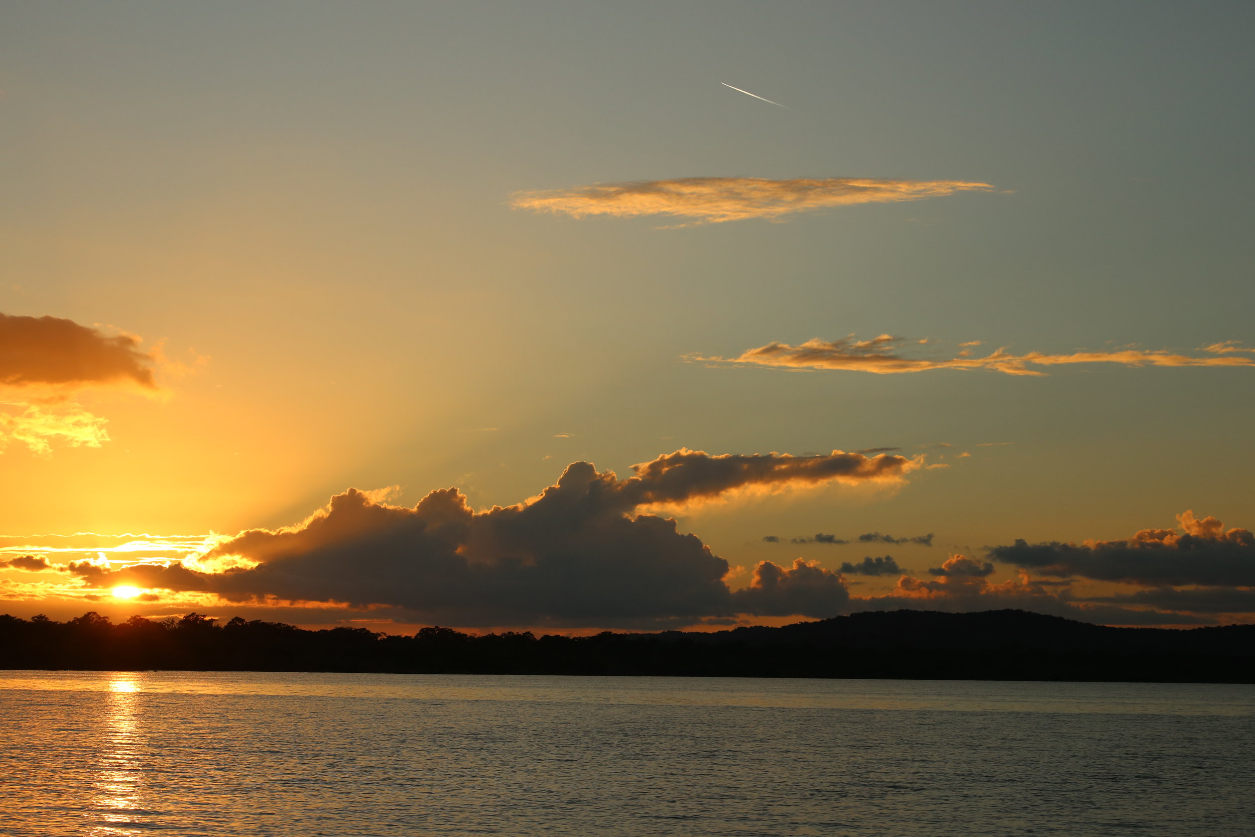 Sunset over Laguna Yaxhá.