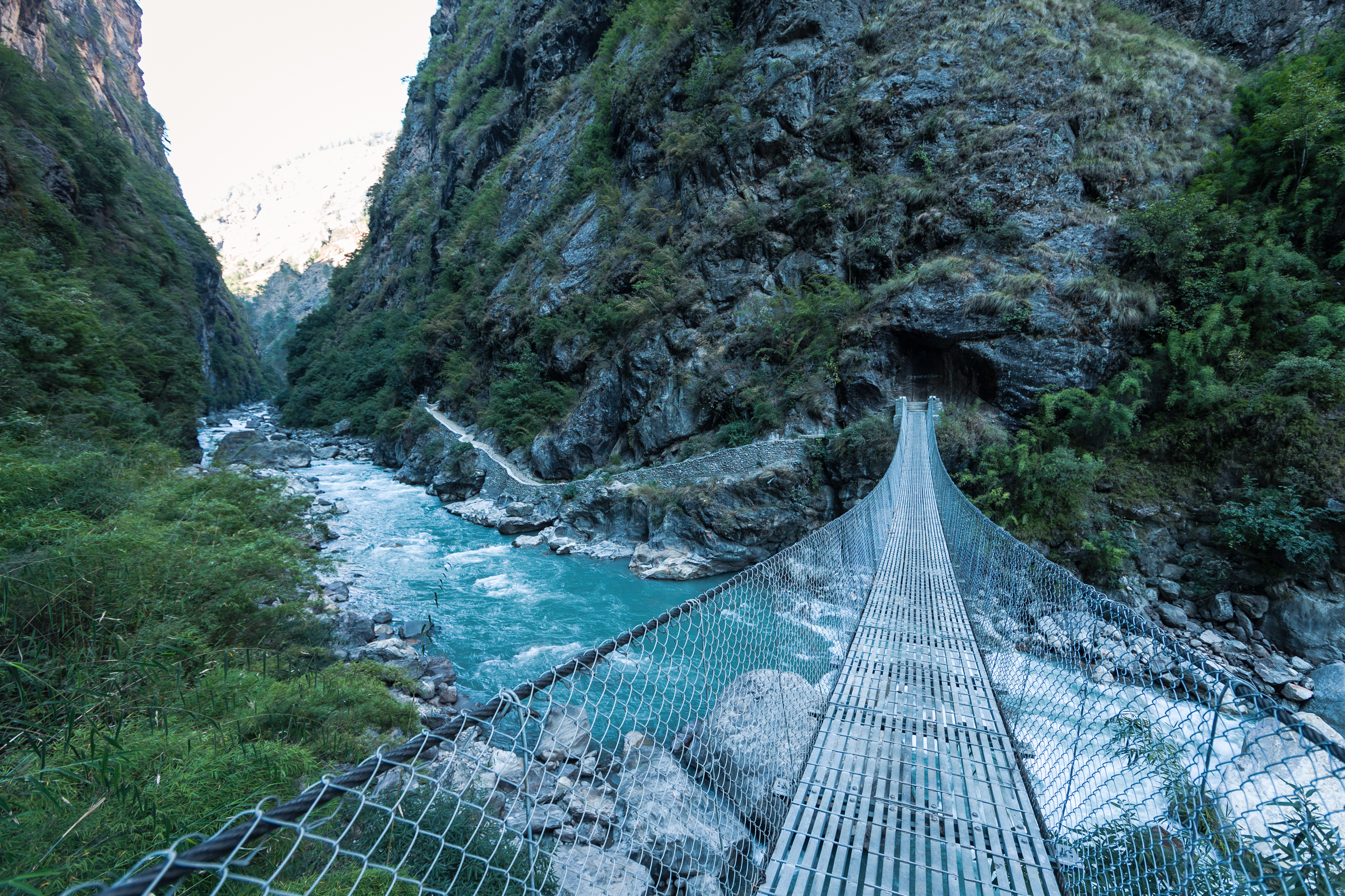 Crossing the Buddhi Gandaki River leading into a narrow gorge on the trail up to Mt. Manaslu.