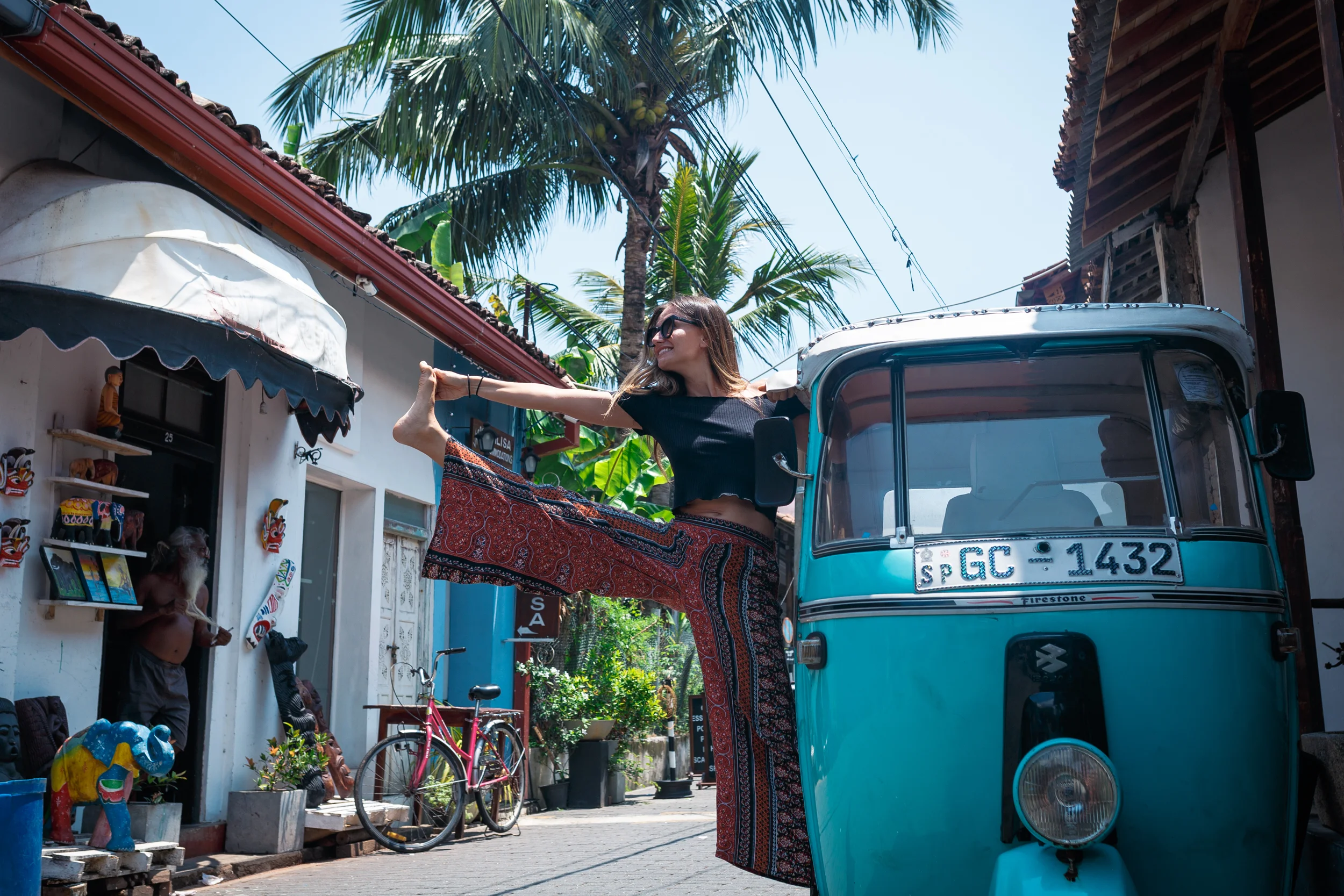 Adzenture co-founder, Daniela, striking a pose out of a tuk-tuk at Galle Fort.