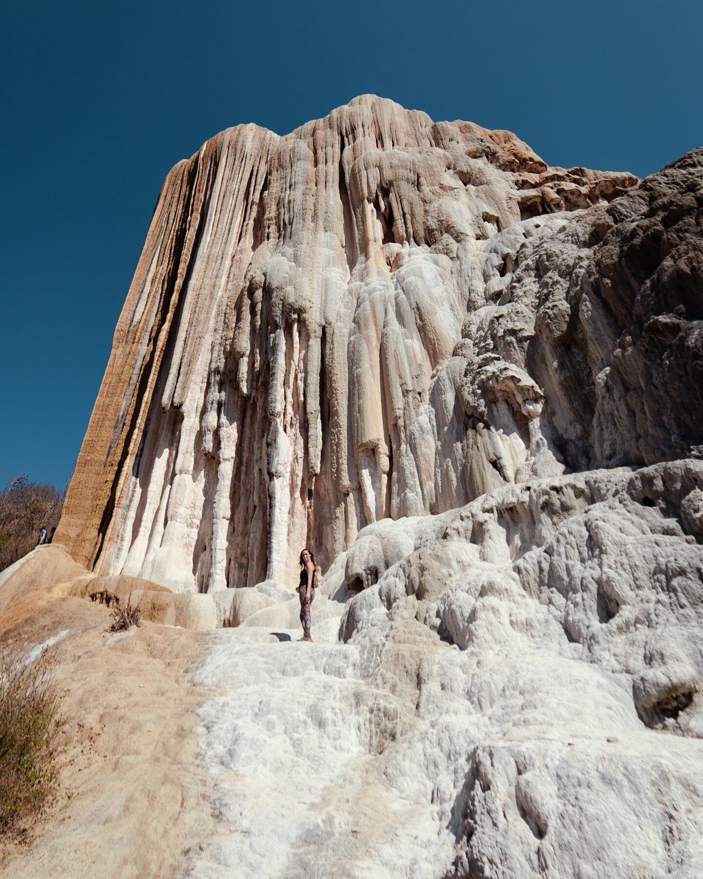 &lsquo;Cascada grande&rsquo; is a natural wonder found deep in the dry desert-like landscape of Oaxaca. This 90m tall formation has been built over time from the hot springs that tumble over the cliffside above, depositing calcium carbonate in their 