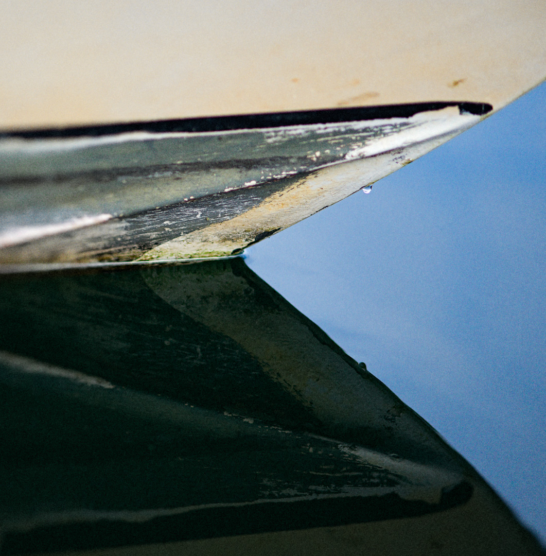 Boat reflection on water