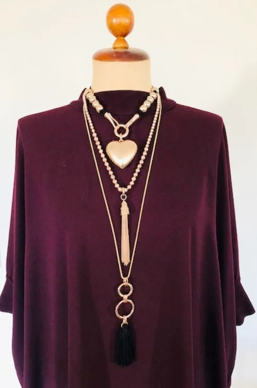 Rose gold makes a striking contrast over dark colours.