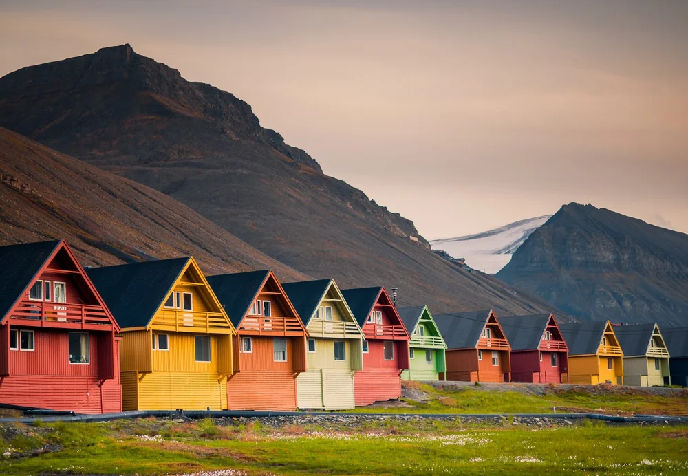 colored houses in norway among the mountains.jpg