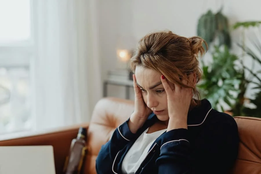 Woman feeling frustrated and overwhelmed about dating and relationships.