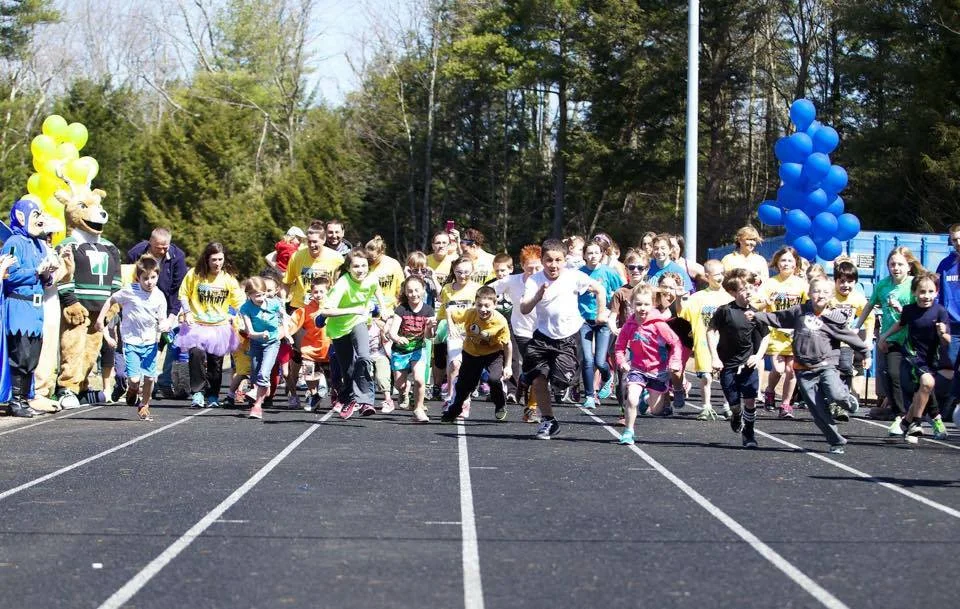 All kids participating in the free fun run get a medal!