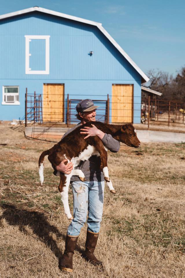 Travis Marak and Cow.jpg