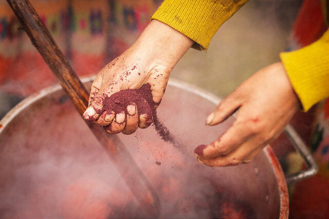 Hands dyeing with cochineal.jpg
